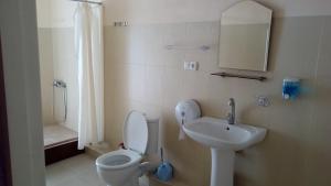 Koupelna v ubytování Hotel Isani