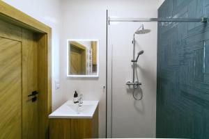 Koupelna v ubytování Enklawa Mielno apartamenty przy plaży + 43 fotografií