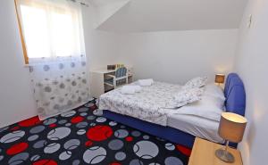 Postel nebo postele na pokoji v ubytování Villa Žnjan