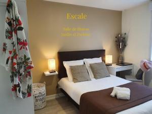 Ένα ή περισσότερα κρεβάτια σε δωμάτιο στο LA MARINA-Center-Parking-StationtoParis