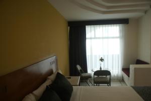Posezení v ubytování Hotel Arcos Aeropuerto + 28 fotografií