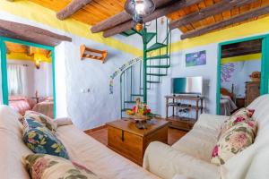 Część wypoczynkowa w obiekcie Casa Rosa, con encanto y piscina climatizada
