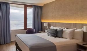 Yachting Hotel Quintero客房内的一张或多张床位