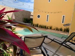 Bazén v ubytování Hotel Boutique SAYAB nebo v jeho okolí