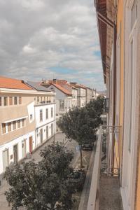 a view of a city street from a building at Burgus Tribute & Design Hotel in Braga