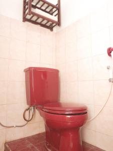Ein Badezimmer in der Unterkunft Rajasa Hotel