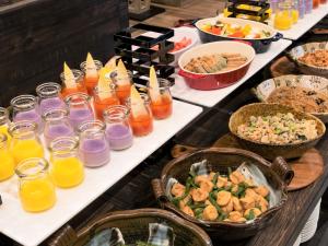 a buffet with many different types of food and drinks at Quintessa Hotel Sapporo Susukino in Sapporo