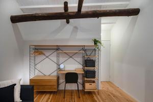 a room with a desk and a chair at Japan Sessions KANZAKI 02 in Osaka