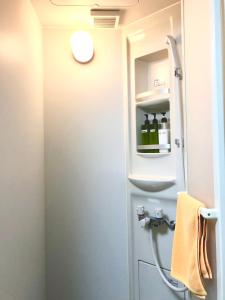 Ванная комната в Fact Dream House 新宿三丁目徒歩3分色々揃うワンルーム