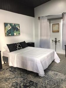 Voodi või voodid majutusasutuse Hotel Cañas toas