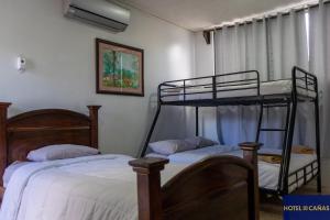 Voodi või voodid majutusasutuse Hotel Cañas toas