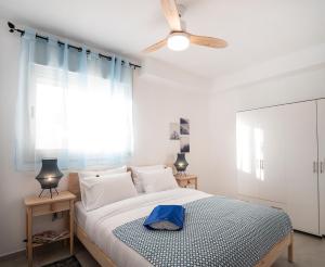 Posteľ alebo postele v izbe v ubytovaní Argaman Beach Apartment