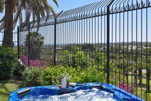 The swimming pool at or close to The Secret Garden Holiday Home