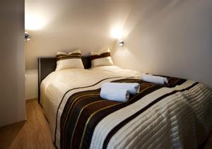Postel nebo postele na pokoji v ubytování Apartament Sarnia Skała Kościelisko