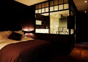 Postelja oz. postelje v sobi nastanitve Lee Design Hotel