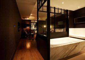 Postelja oz. postelje v sobi nastanitve Lee Design Hotel