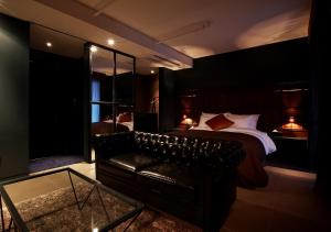 Postelja oz. postelje v sobi nastanitve Lee Design Hotel