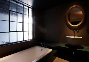 Kopalnica v nastanitvi Lee Design Hotel