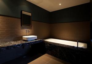 Kopalnica v nastanitvi Lee Design Hotel