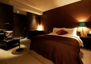 Postelja oz. postelje v sobi nastanitve Lee Design Hotel