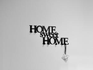 a sign with the words home sweet home at Elia1141 in Venice