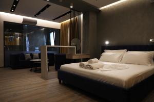 Ліжко або ліжка в номері Hotel Triumf Shengjin