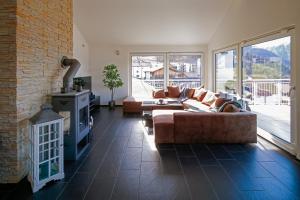 Posezení v ubytování Modern and cosy 5 rooms penthouse with stunning view