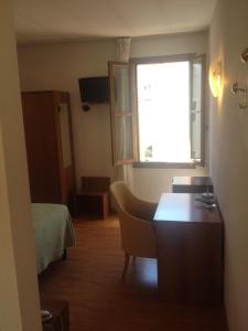 Postel nebo postele na pokoji v ubytování Hotel Terme Belvedere
