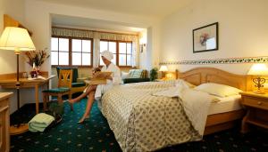 Postel nebo postele na pokoji v ubytování Landhotel Spreitzhofer