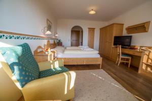 Ένα ή περισσότερα κρεβάτια σε δωμάτιο στο Landhotel Spreitzhofer