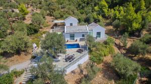 an overhead view of a house with a swimming pool at Villa Aquilo in Megali Ammos
