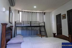 Voodi või voodid majutusasutuse Hotel Cañas toas