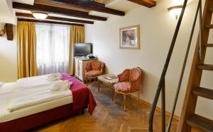 Posteľ alebo postele v izbe v ubytovaní Hotel Residence Green Lobster