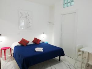 Voodi või voodid majutusasutuse B&B L'Altare Bianco toas