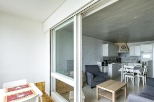 مطبخ أو مطبخ صغير في Le Gréement - Appt vue sur le port