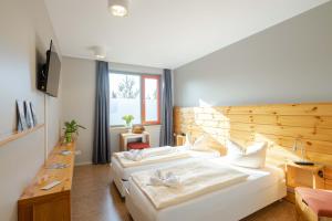 Ένα ή περισσότερα κρεβάτια σε δωμάτιο στο Haus 54