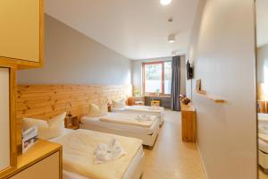 Ein Bett oder Betten in einem Zimmer der Unterkunft Hostel Haus 54