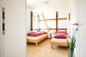 Postel nebo postele na pokoji v ubytování Das Landhaus