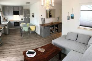 Kuchyň nebo kuchyňský kout v ubytování Ferienhaus Good Times mit eigenem Steg Ferienpark Vislust Ijsselmeer