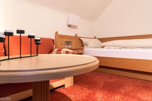 Postel nebo postele na pokoji v ubytování Landhotel Baumwipfel