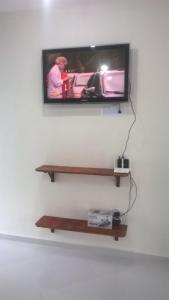Телевизор и/или развлекательный центр в Cobertura com área privativa,a melhor Vista.