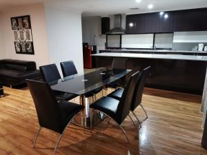 A kitchen or kitchenette at Perth Urban Lodge