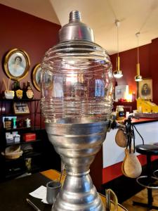 a glass jar sitting on top of a table at B&B Casa Ortega in Marseille