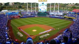 a crowd of people watching a baseball game at Crowne Plaza Kansas City Downtown, an IHG Hotel in Kansas City