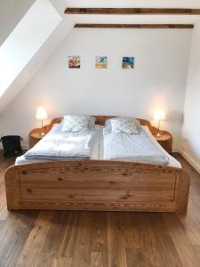 Posteľ alebo postele v izbe v ubytovaní Deichhof Knudsen
