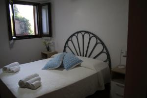 Postel nebo postele na pokoji v ubytování B&B Sa Serra