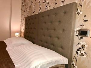 A bed or beds in a room at Bed & Breakfast De Nittis