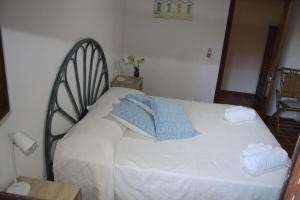 Postel nebo postele na pokoji v ubytování B&B Sa Serra