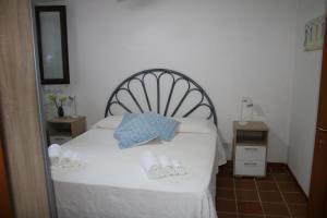 Postel nebo postele na pokoji v ubytování B&B Sa Serra