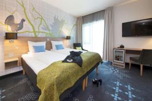 Cama o camas de una habitación en Thon Partner Elgstua Hotel